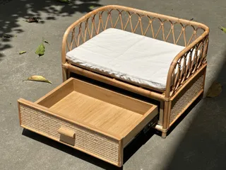 Woven rattan baby seat with cushion and pull-out storage drawer