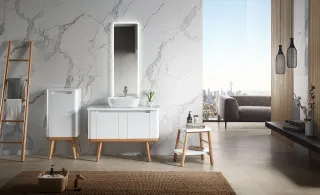 White bathroom vanity with vessel sink, mirror and wall-mounted cabinet.