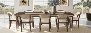 Wood dining table and upholstered dining chairs in a bright room.