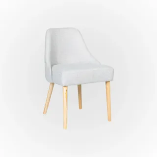 Light gray upholstered dining chair with tapered wooden legs
