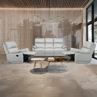 White sofa and two reclining chairs in a slatted-wall living room
