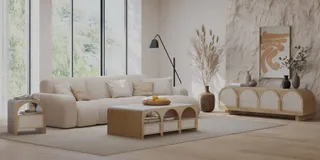 Beige sofa, wood coffee table and curved storage cabinet in a living room