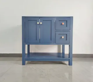 Blue painted sideboard with paneled doors, drawers and an open lower shelf